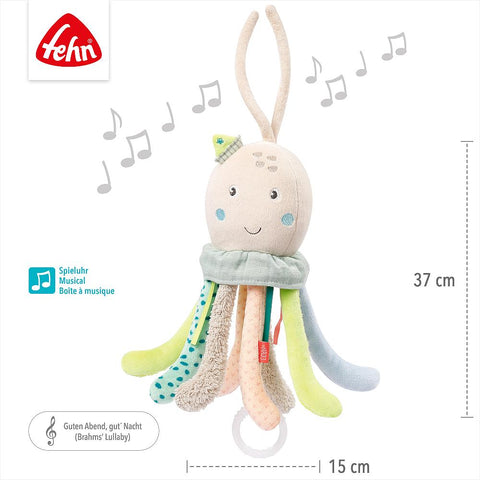 Spieluhr Oktopus, 37 cm hoch und 15 cm breit, mit lachendem Gesicht, strukturierten Tentakeln und Ziehring für beruhigende Melodie-ideal als Baby Einschlafhilfe. Fehn Logo oben links.