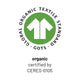 Die Rassel Hund trägt das grün-weiße Logo des Global Organic Textile Standard (GOTS) mit der Aufschrift "Bio-zertifiziert durch CERES-0105". Hergestellt in Deutschland aus kontrolliert biologischem Anbau (kbA).